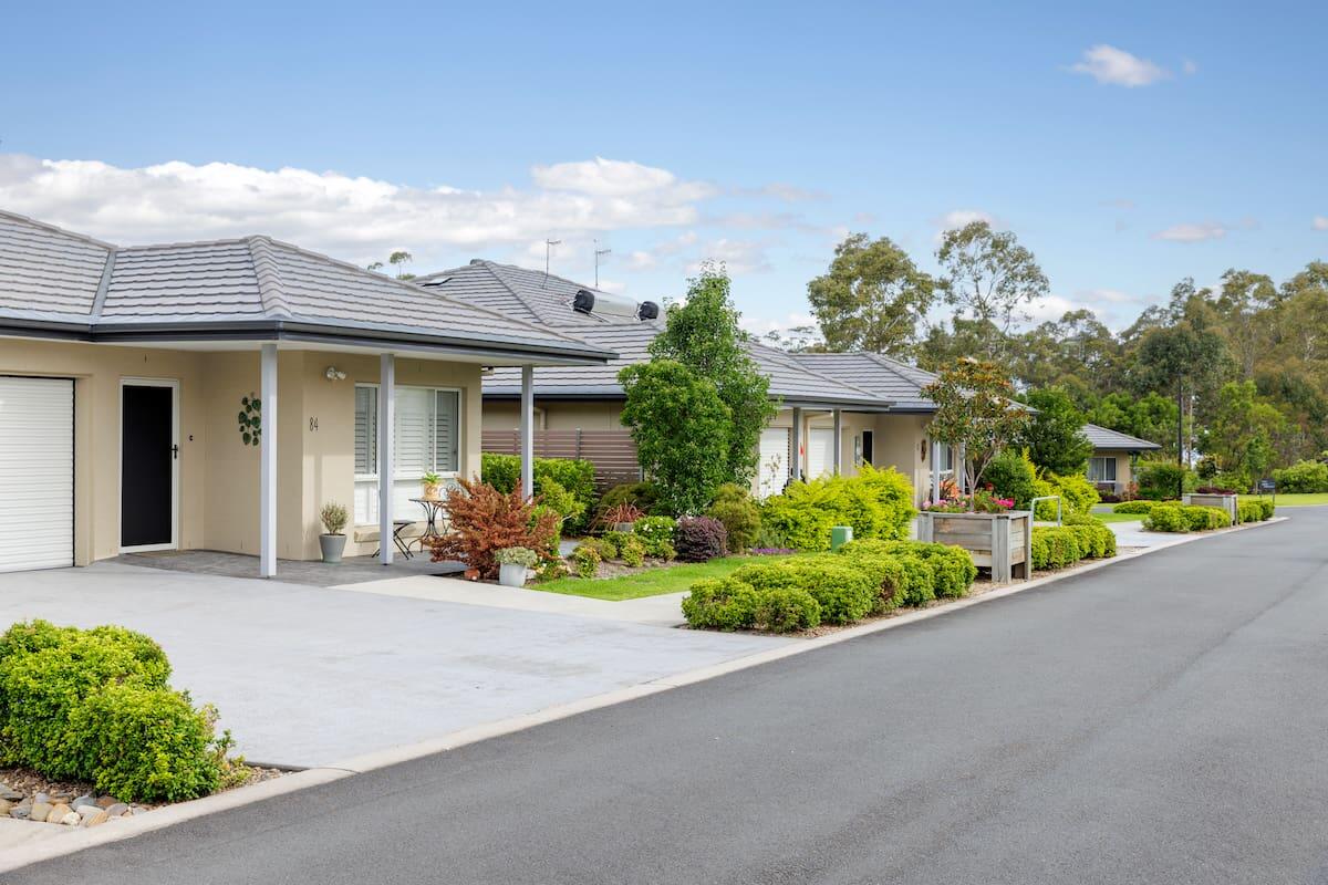 Image of Island Point Retirement Living Village Street with Villas in Background 